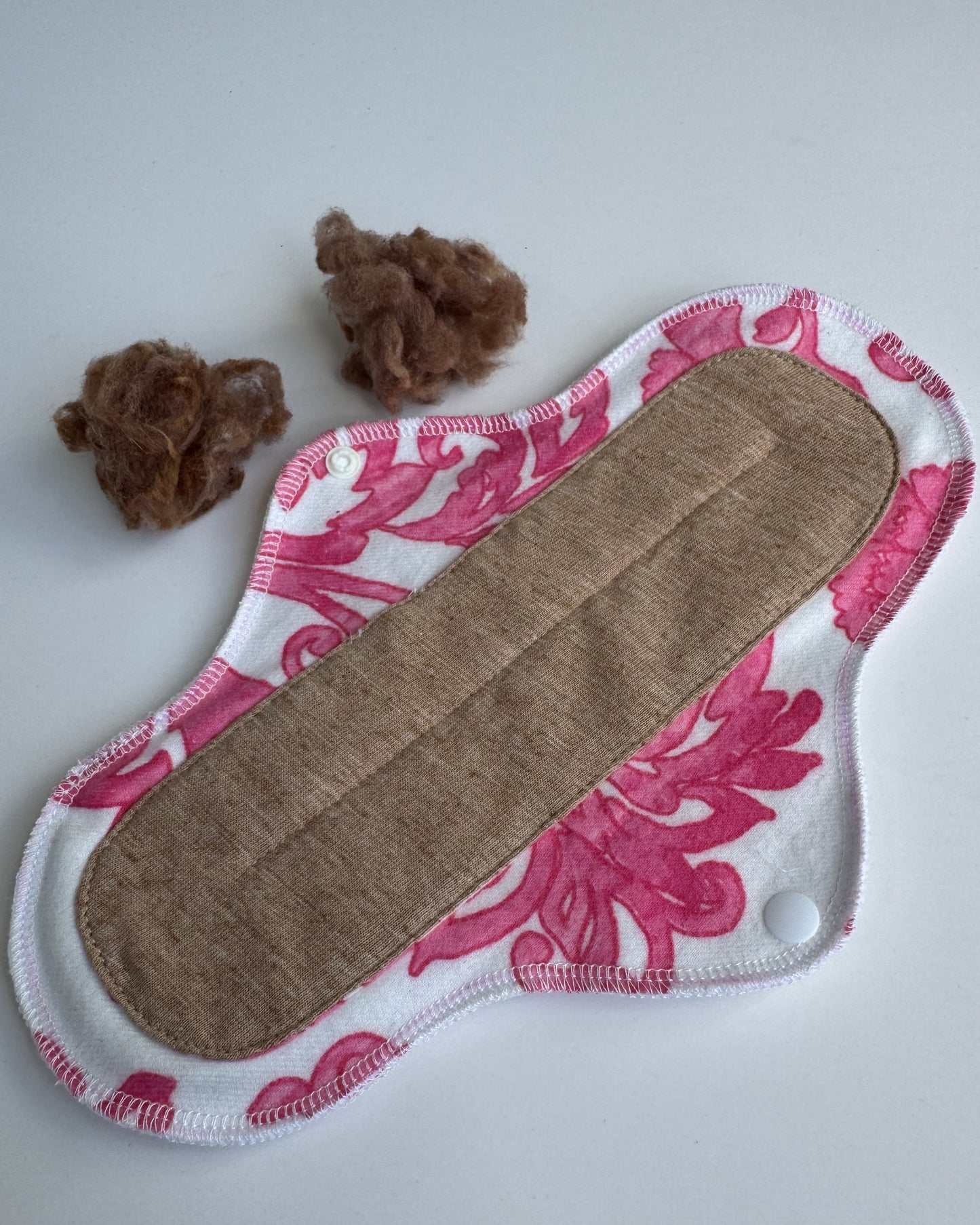 Toalla menstrual terapéutica
